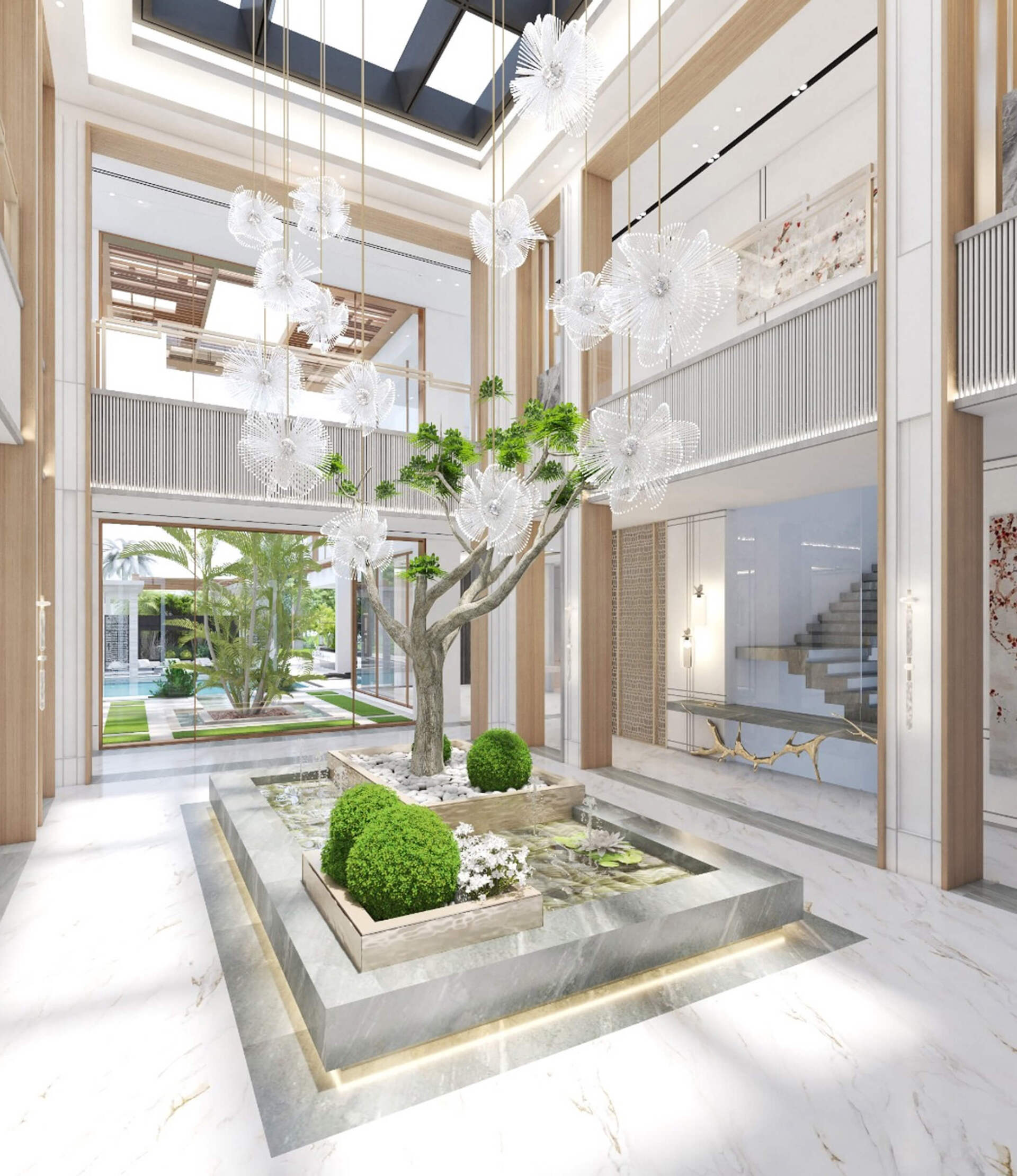 Luxurious atrium: indoor tree in pond, light colors, high ceilings, chandelier, skylight, two-story design.