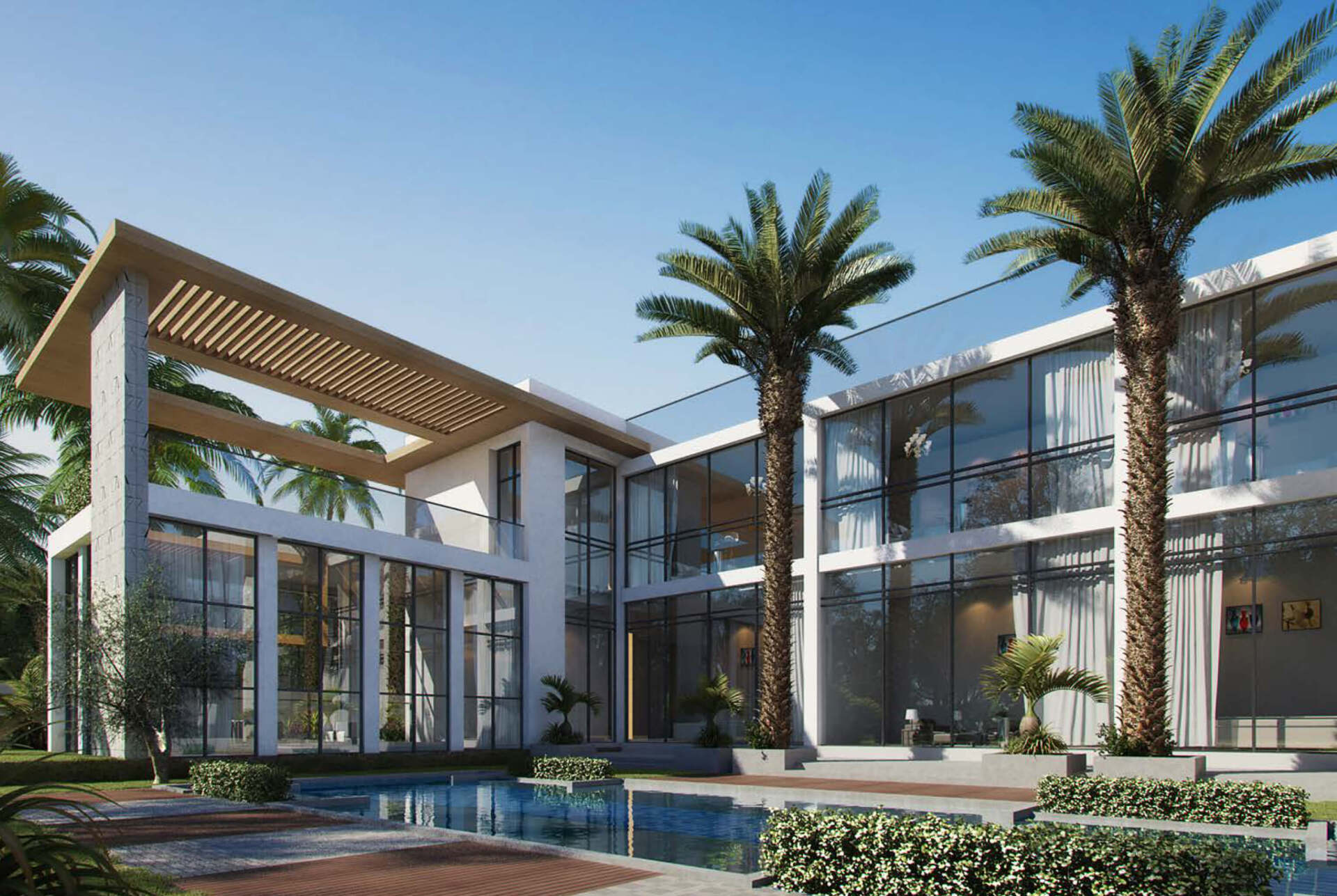 Modern white house with glass walls and palm trees by a pool.