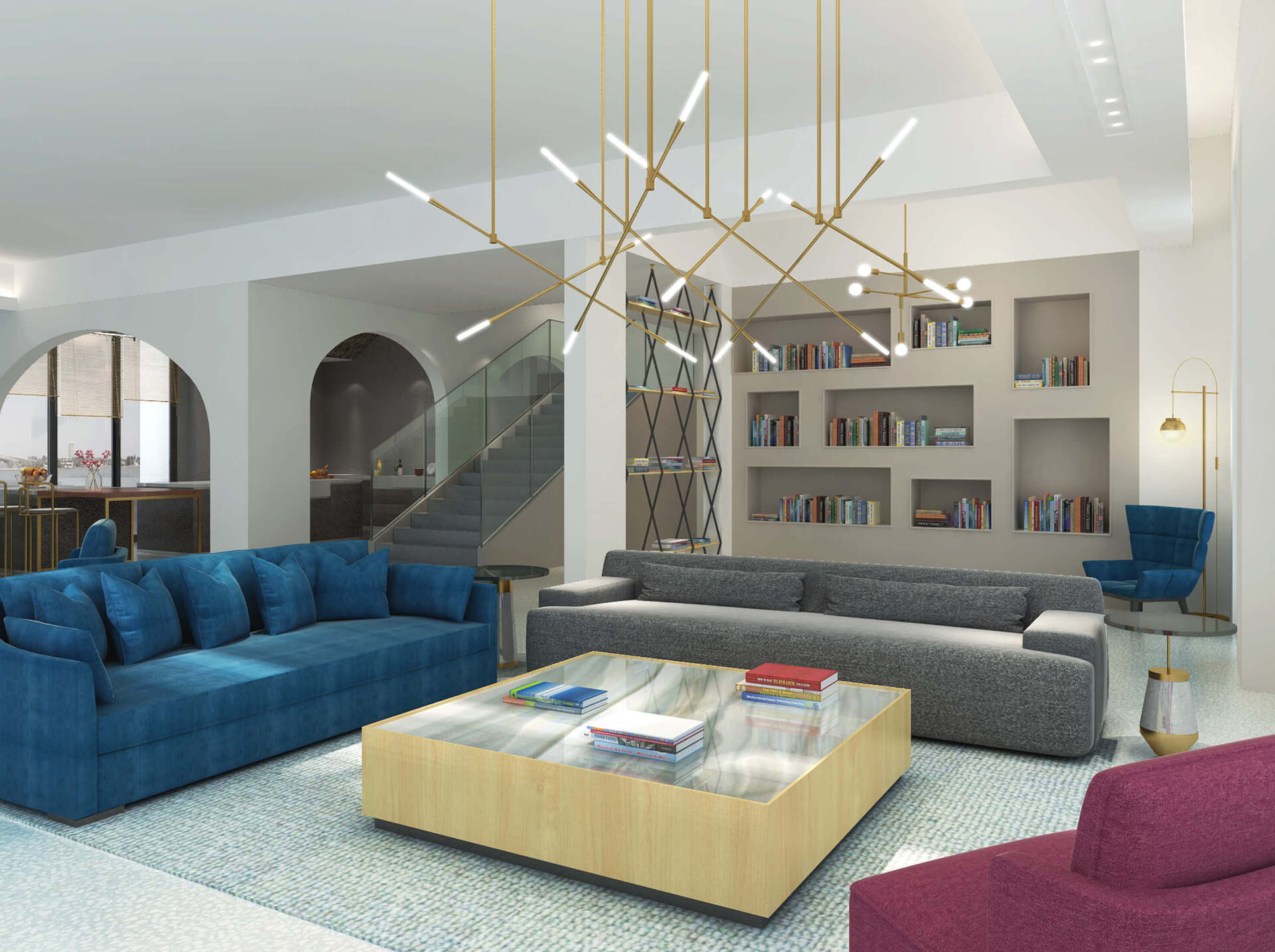 Modern living room with blue, gray, and pink couches, a geometric light fixture, and built-in bookshelves.