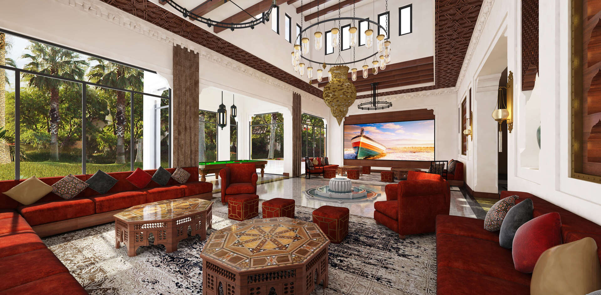 Luxurious living room with red couches, carved tables, chandelier, and a view of trees.