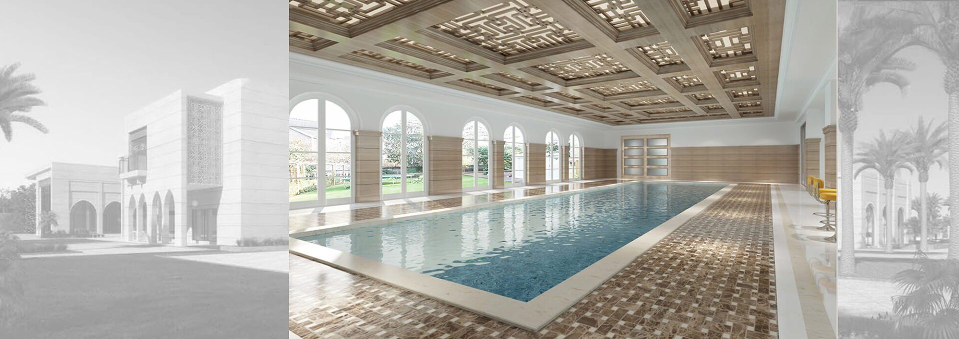 Indoor pool with ornate ceiling and large arched windows.