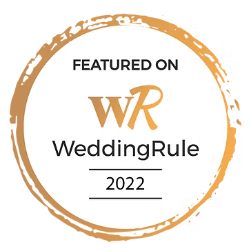 A gold circular seal with the text