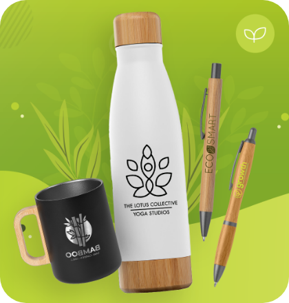 A water bottle , a mug , and two pens are sitting on a green surface.