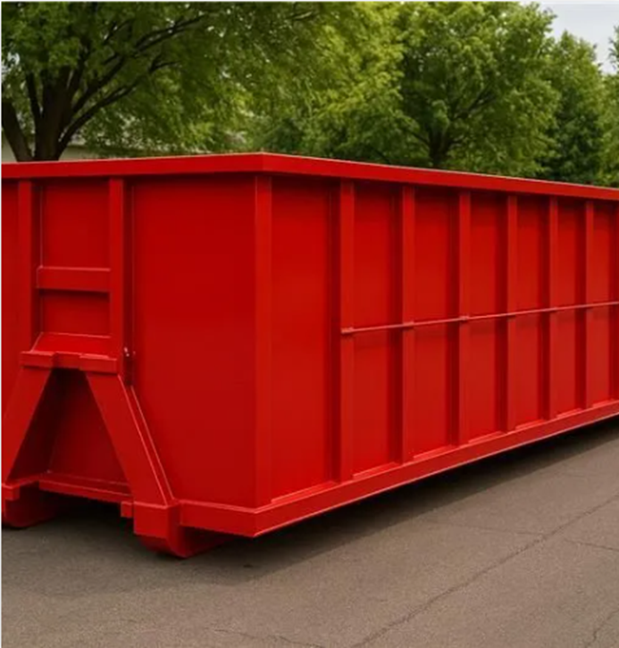 A Red dumpster on the driveway.