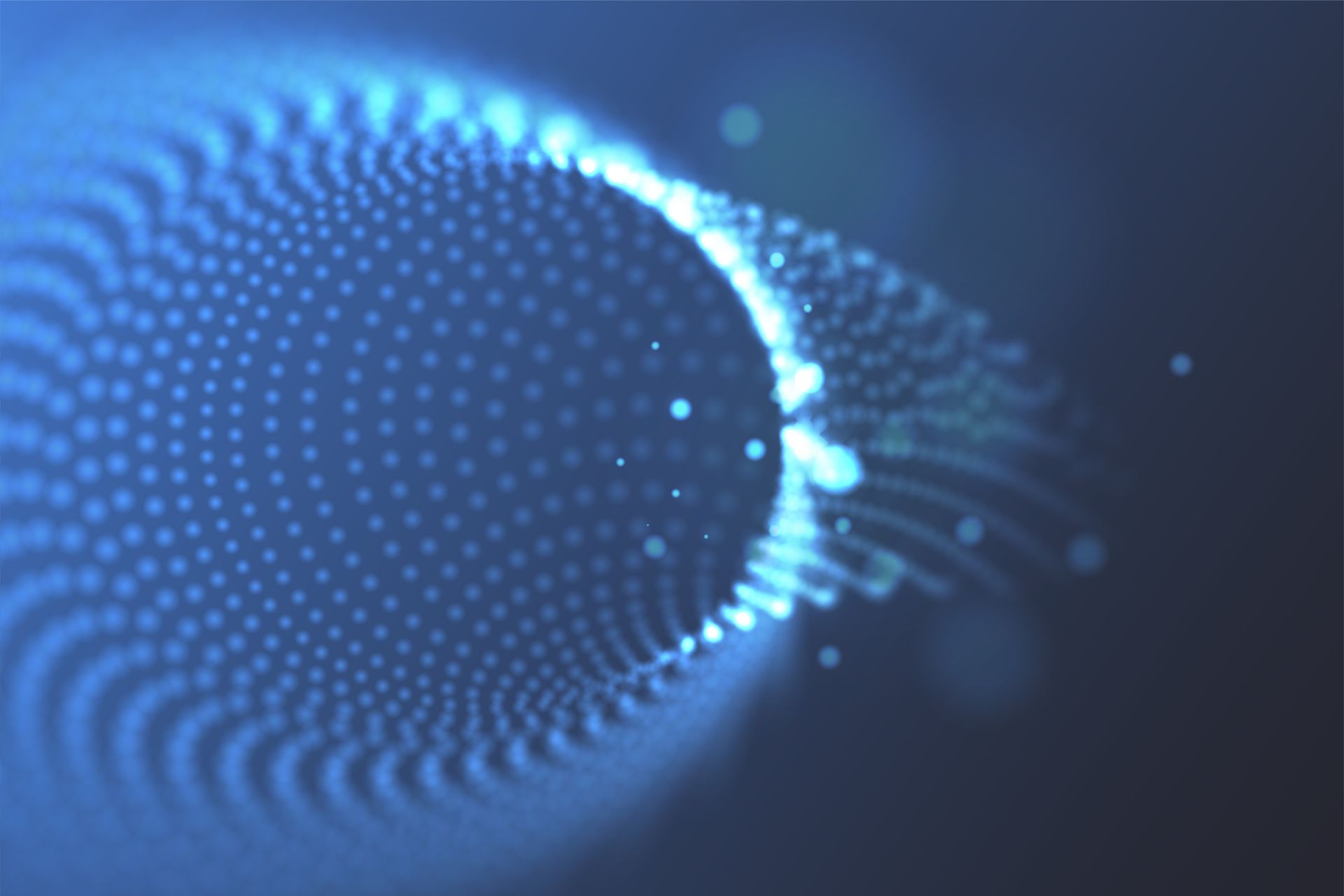 A blue background with a circle of dots on it