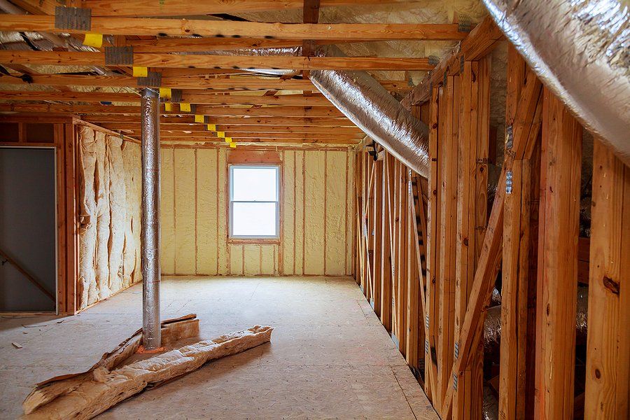 wood house frame with insulation foam