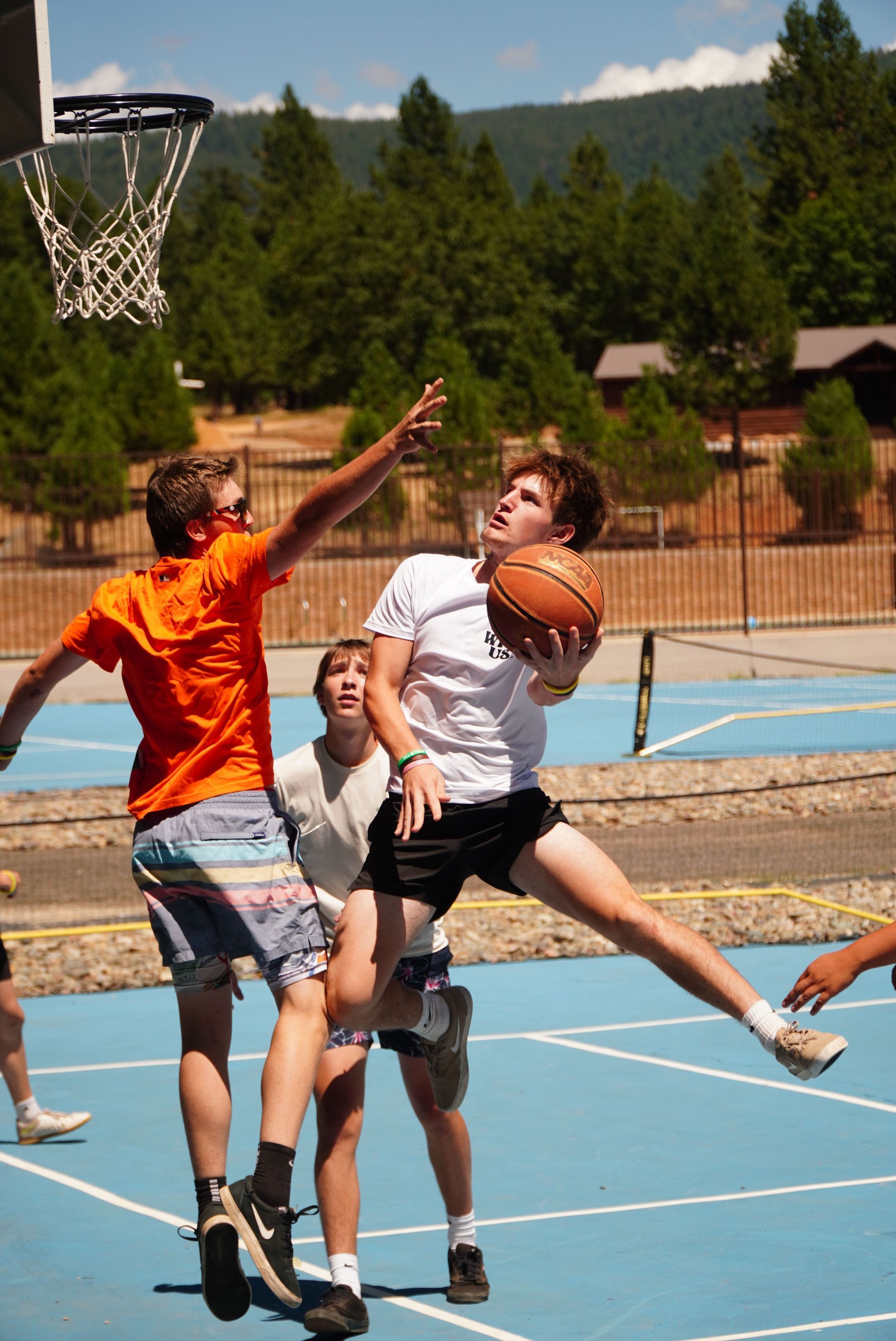 High school boys playing basketball