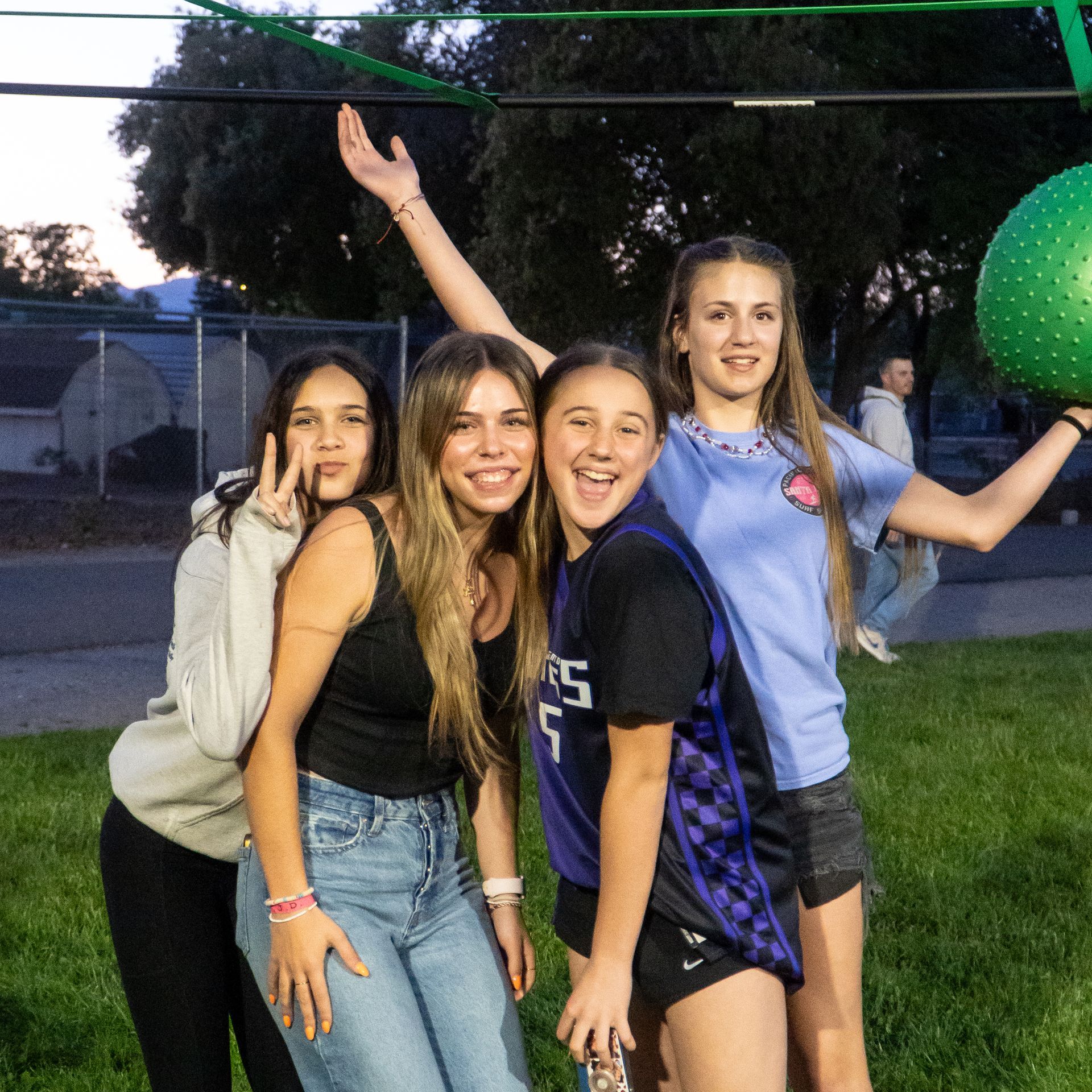 teenage girls smiling, outdoors