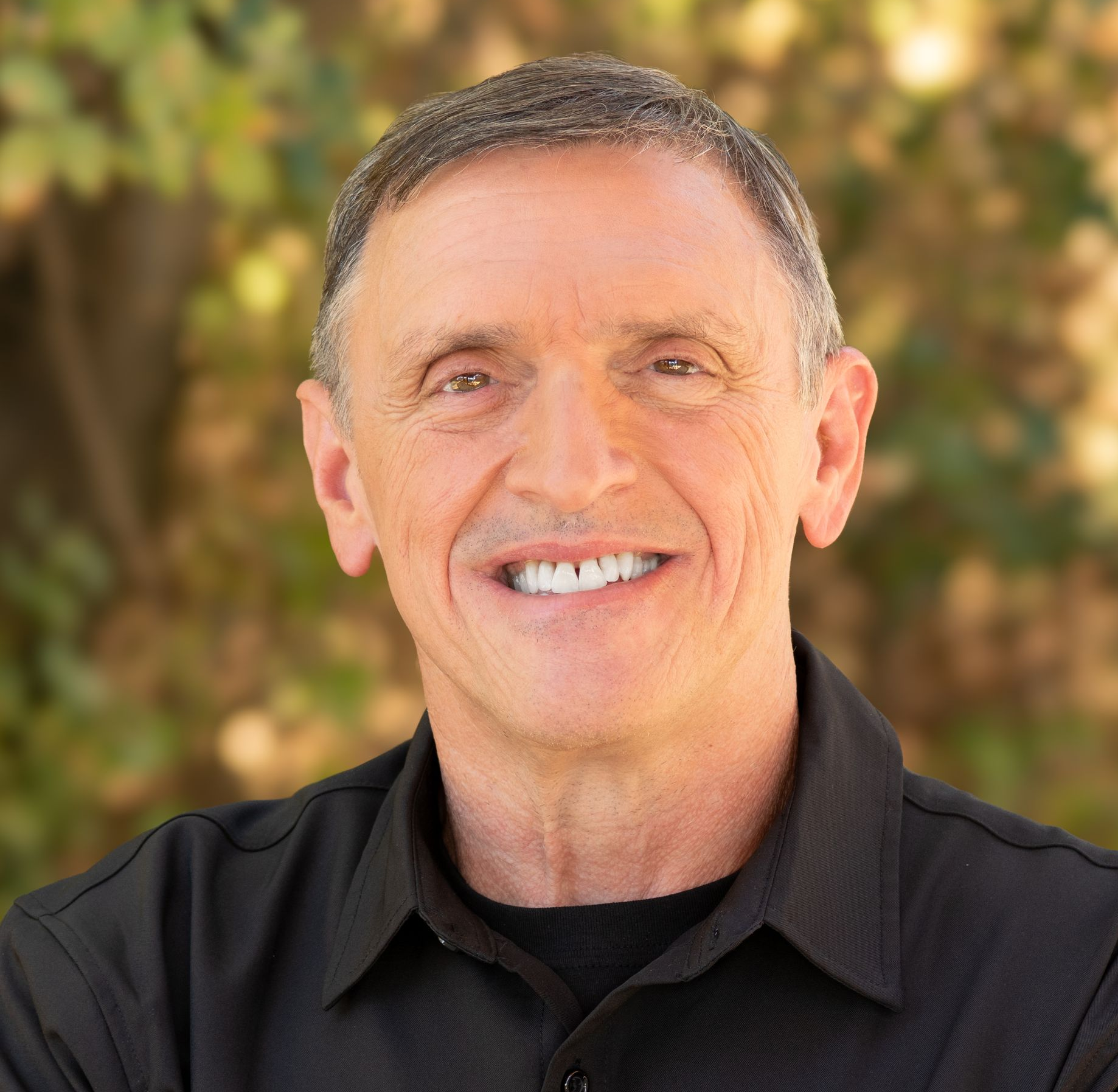 photo of smiling older male pastor