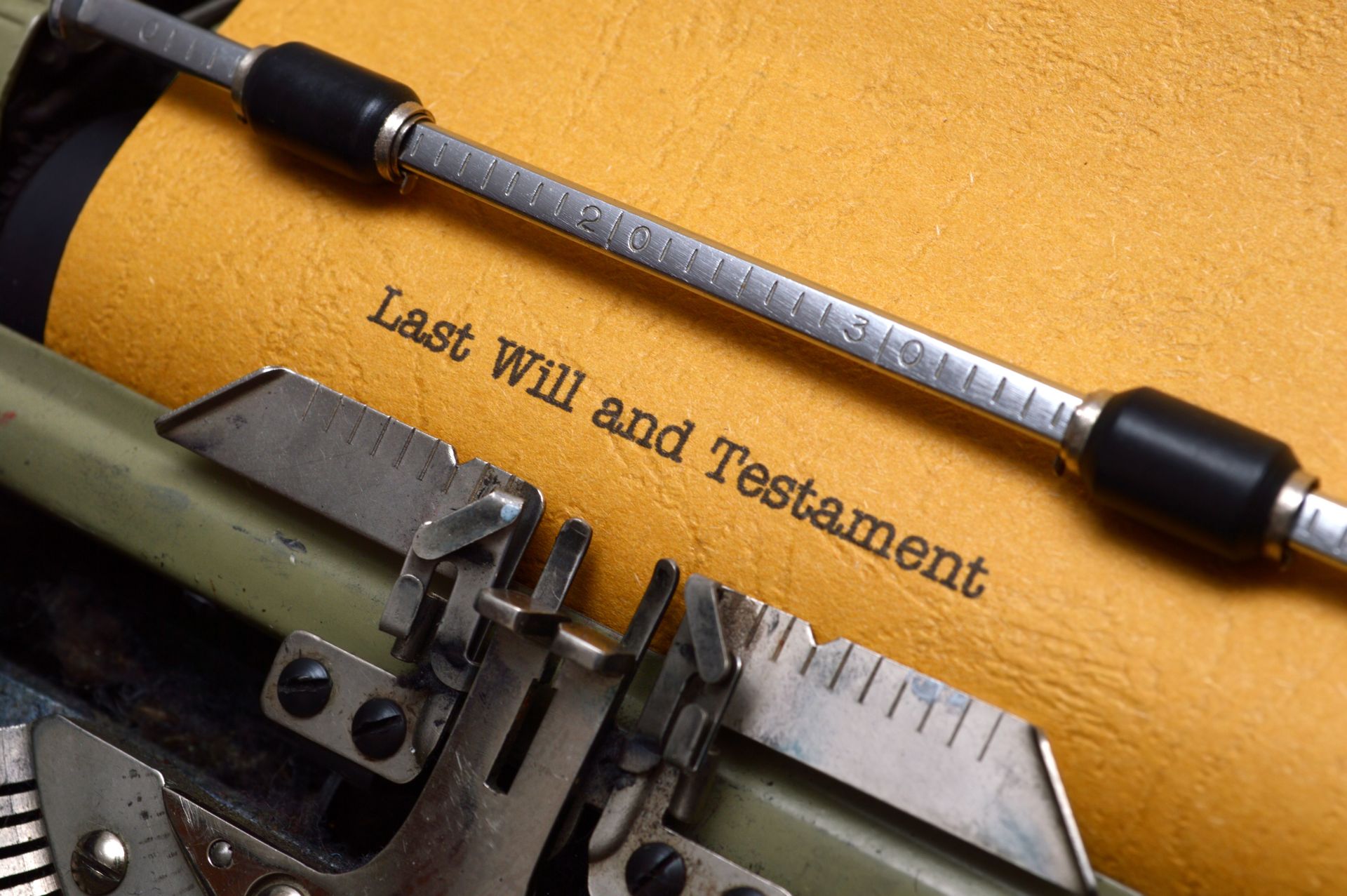 A typewriter with the words last will and testament written on it.