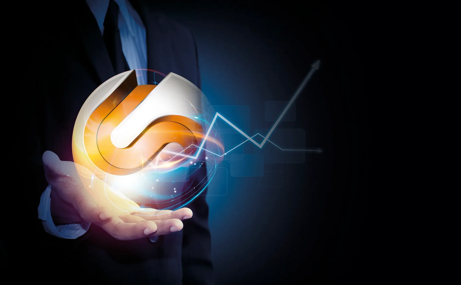 Man in suit holding a glowing logo and growth graph.