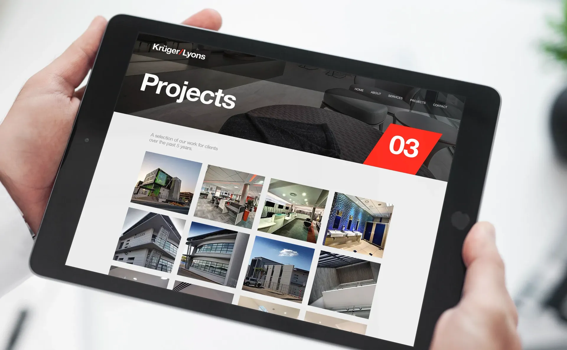 Person holding a tablet displaying a 