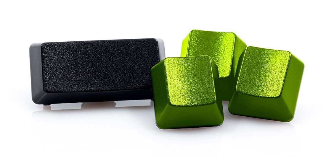 Black and green keyboard keycaps on a white background.