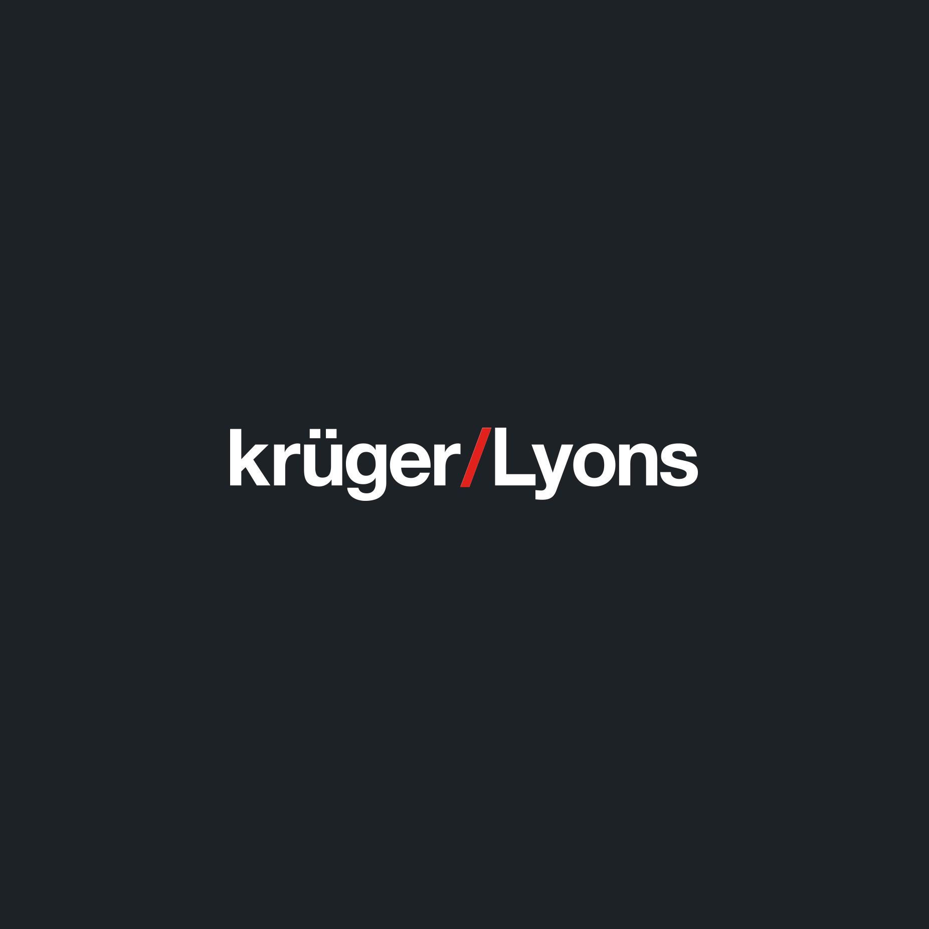 Logo for Krüger Lyons, white text on a dark background, red slash between names.