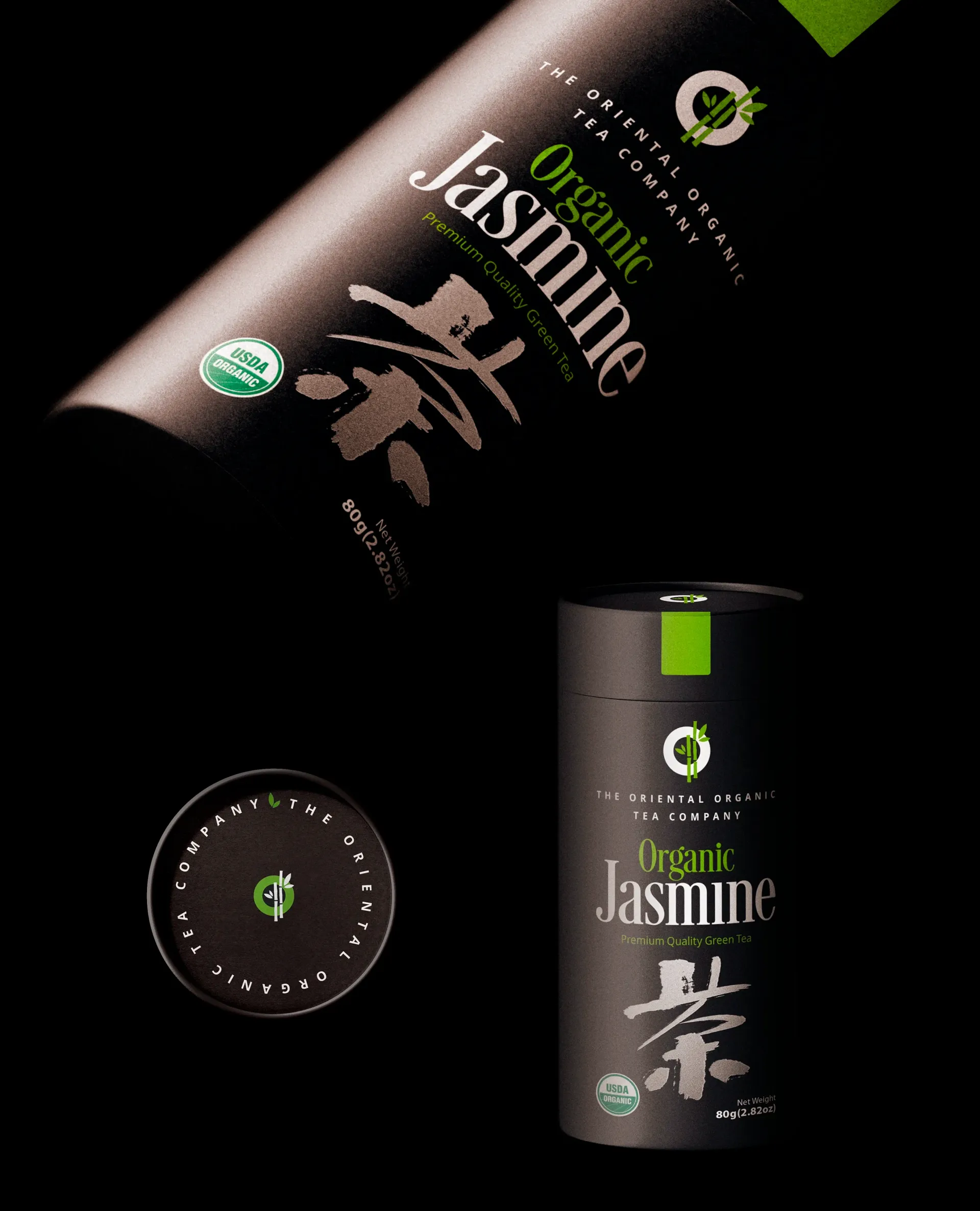 Black cylindrical container of Organic Jasmine tea, with green and white text and accents on a black background.
