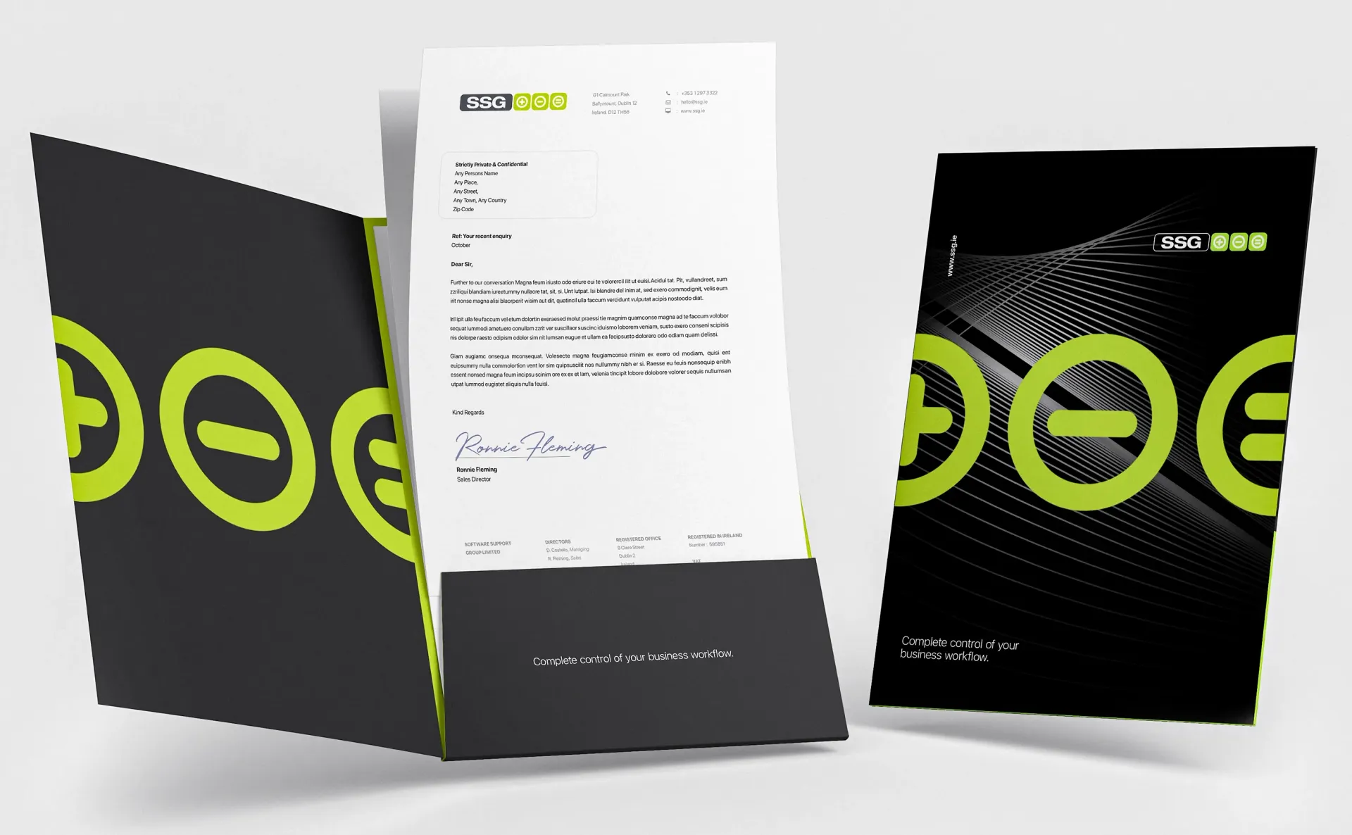 Brochure with a letter inside, featuring a green and black design with plus and minus symbols.