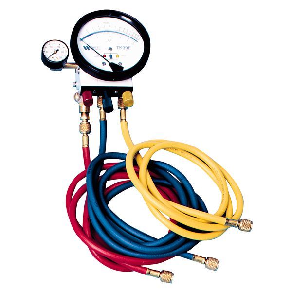 A gauge with three hoses attached to it