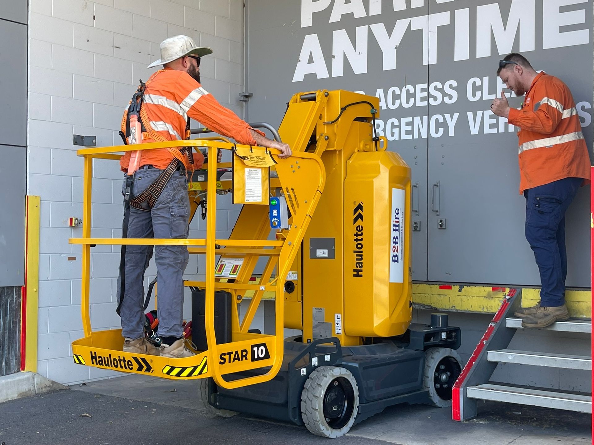 A Group Of Blue Aerial Lifts Against A Blue Sky — B2B Hire In Garbutt, QLD