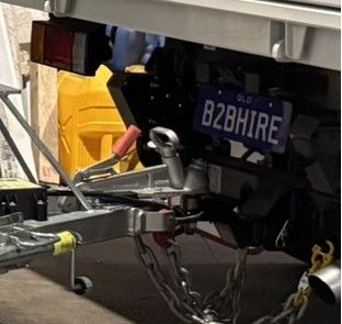A Trailer Hitch With A Chain Attached To It — B2B Hire In Garbutt, QLD