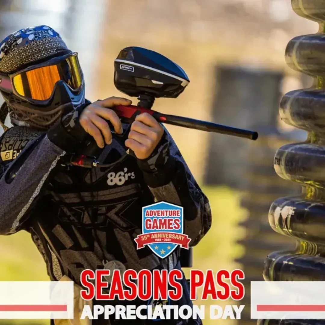 Person in paintball gear aiming gun at Adventure Games Season Pass Appreciation Day.