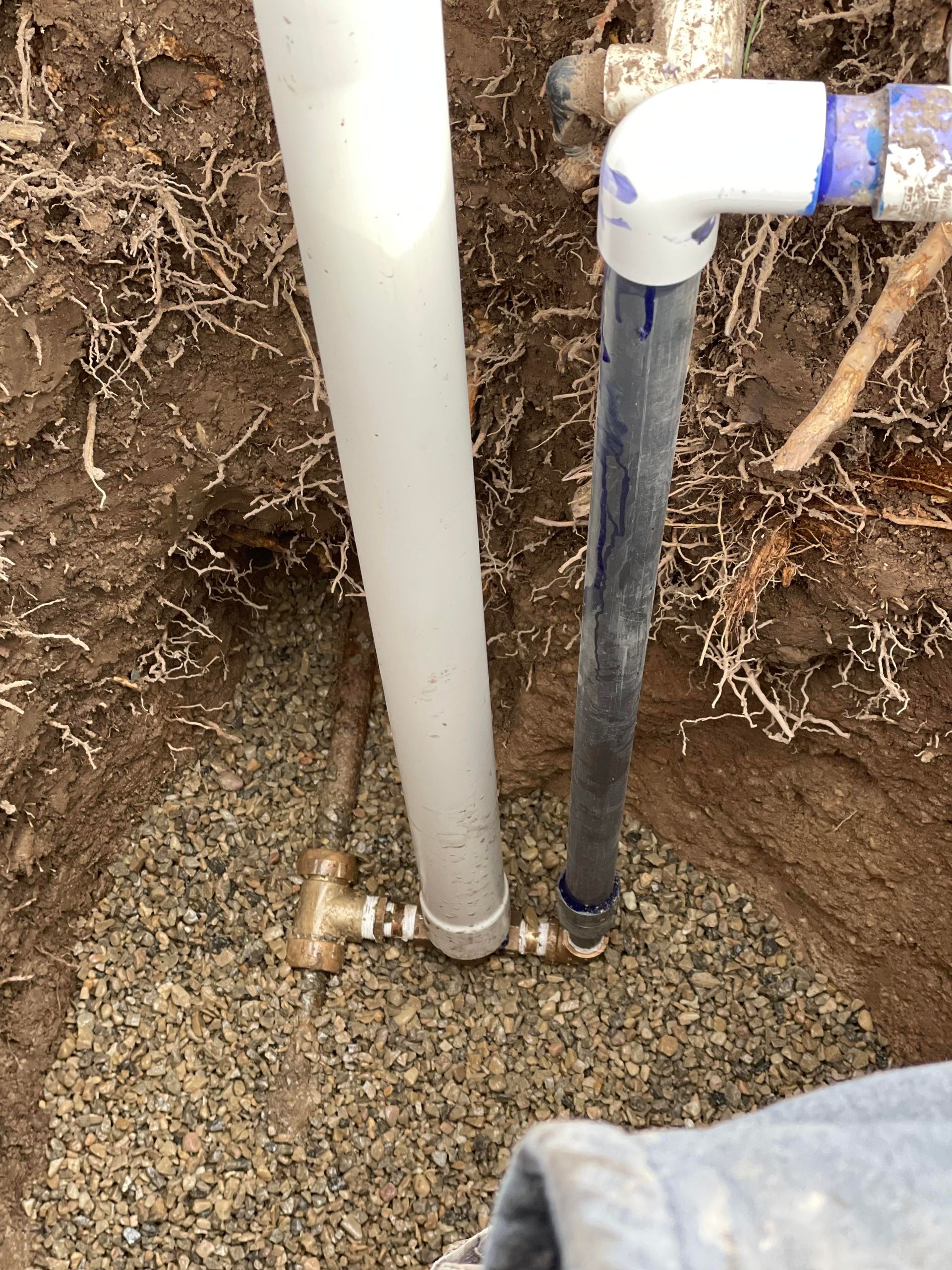 in-ground view of sprinkler stop and waste valve installation