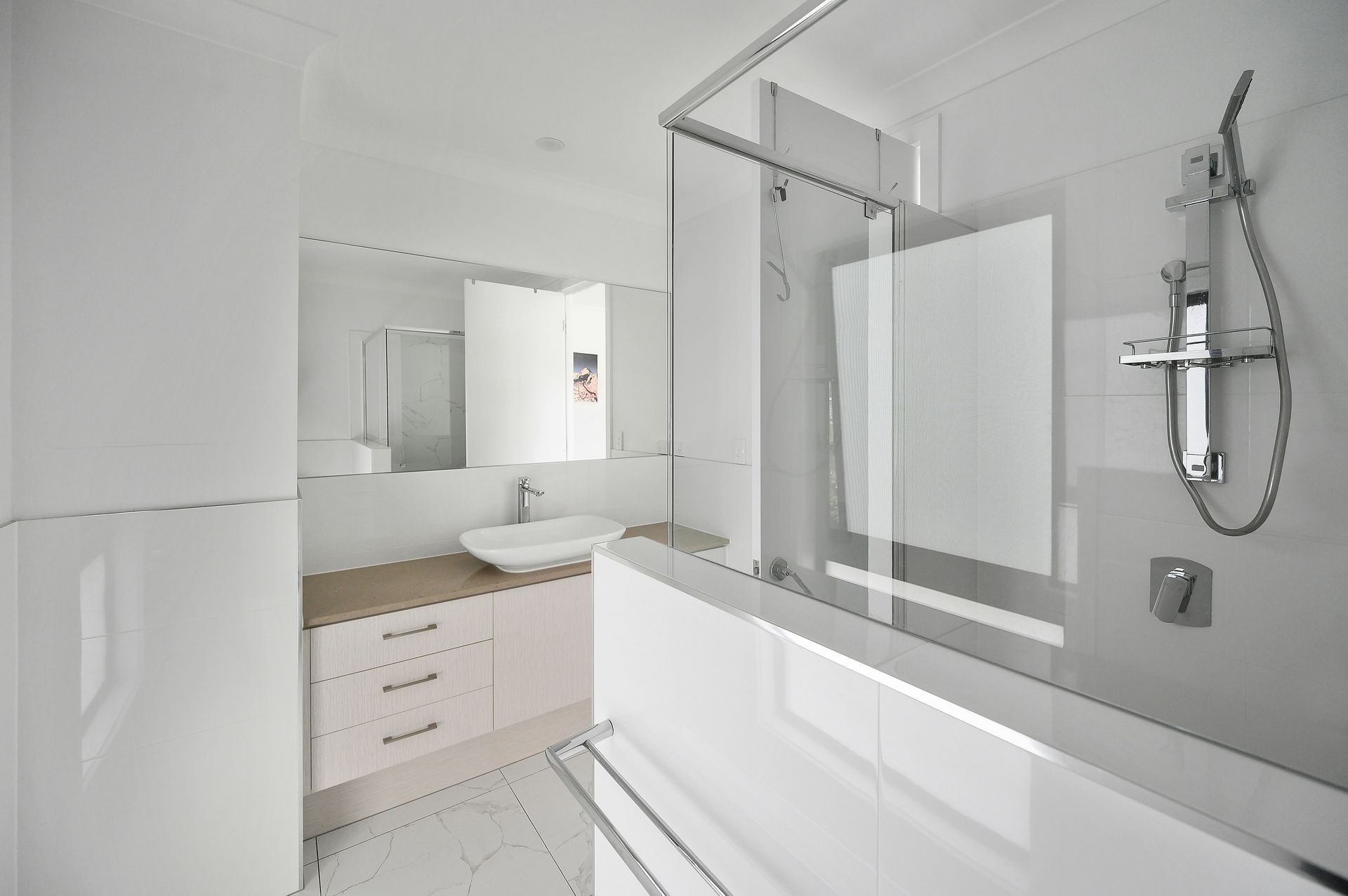 white silver bathroom with a shower