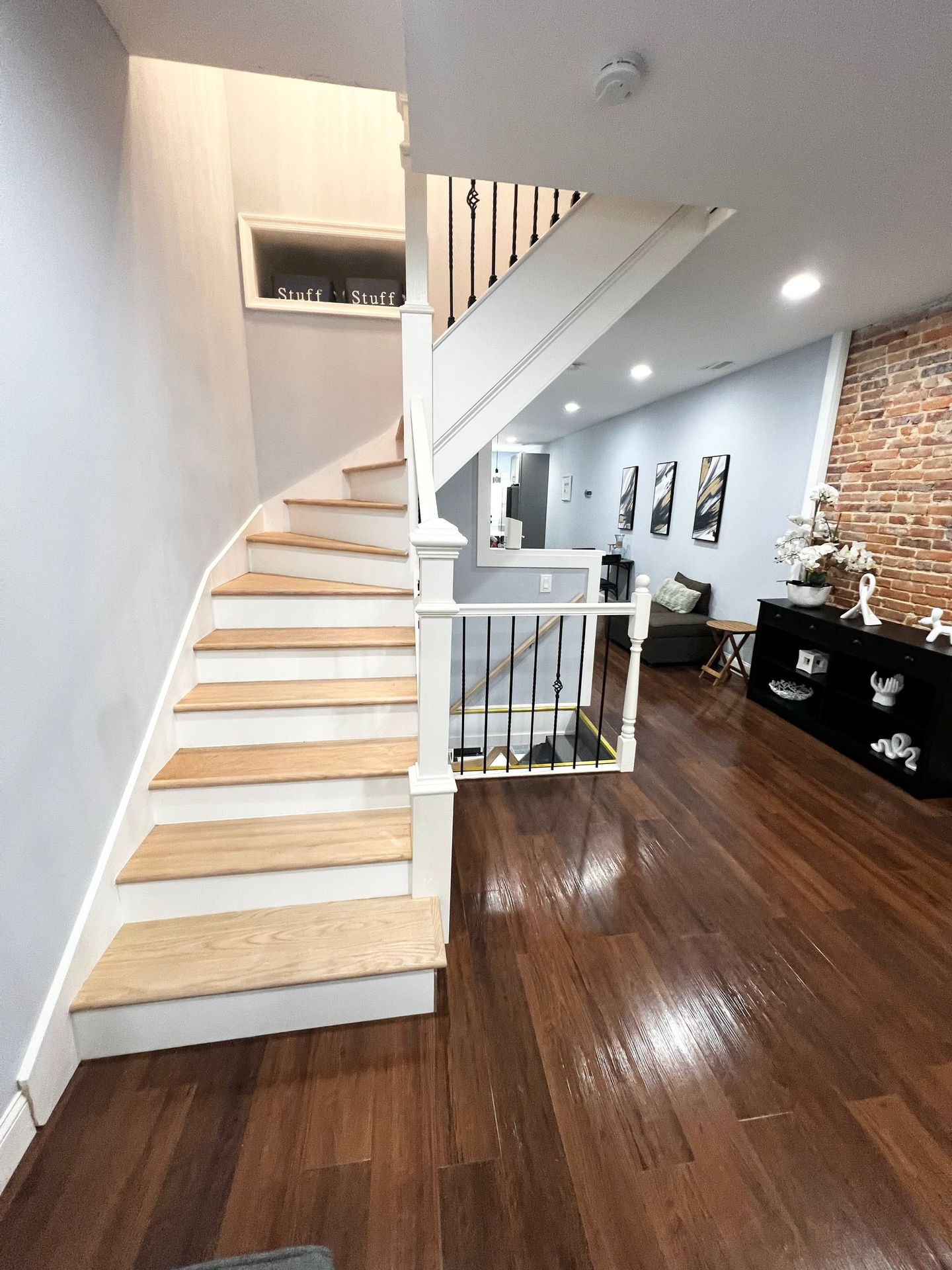 A staircase leading up to the second floor of a house