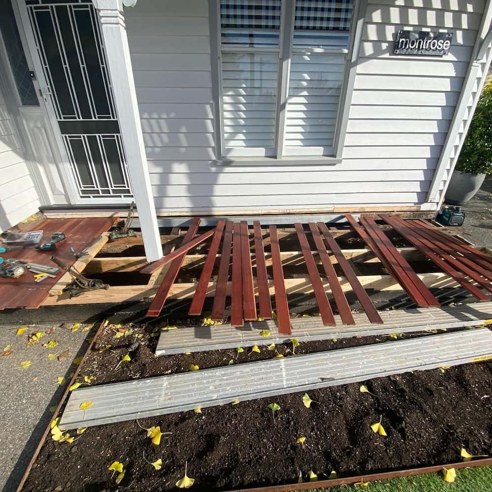 Wooden Deck Is Being Built in Front of A White House — Flintoff Constructions in Charlemont, VIC
