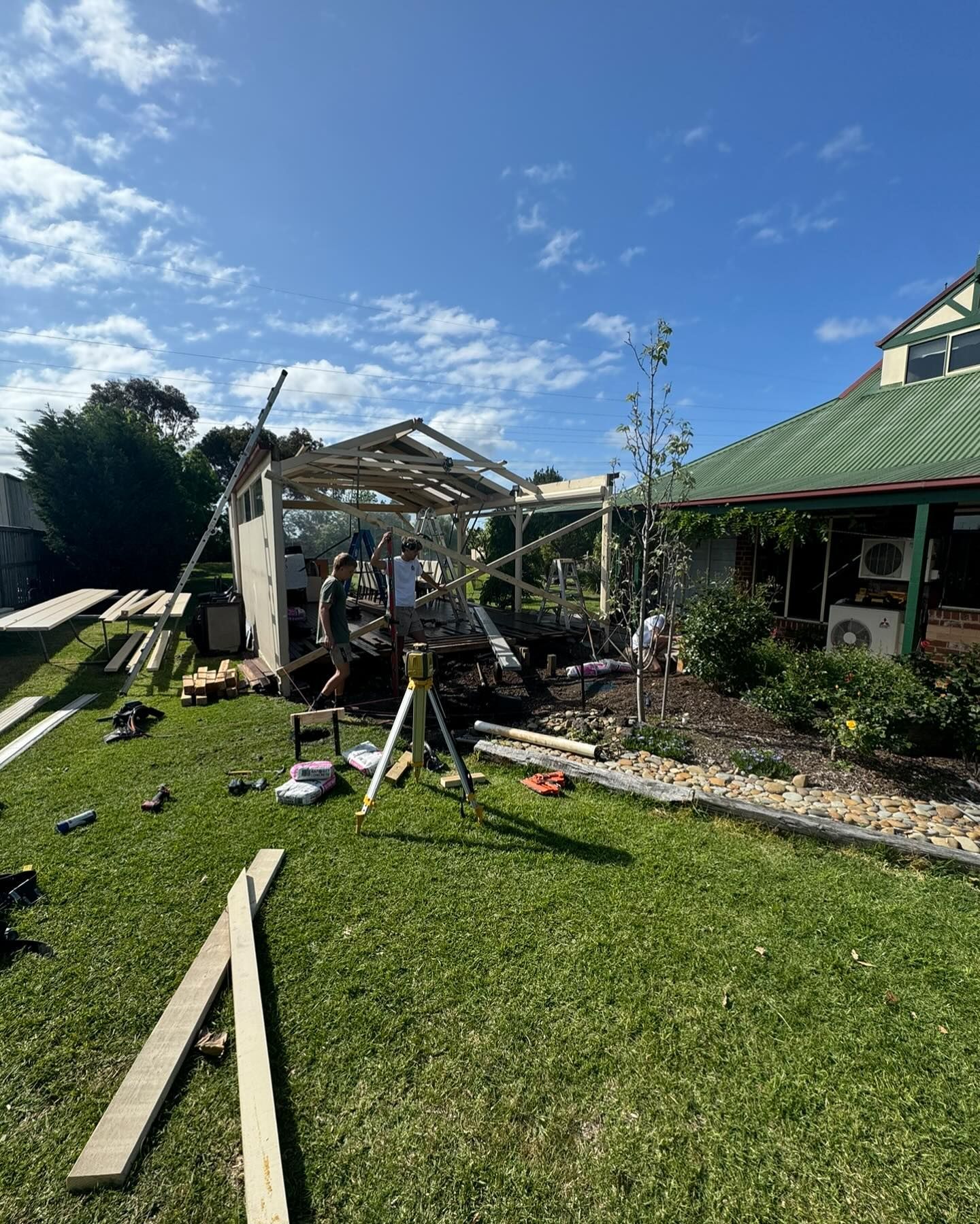 A backyard with a large wooden fence — Flintoff Constructions in Charlemont, VIC