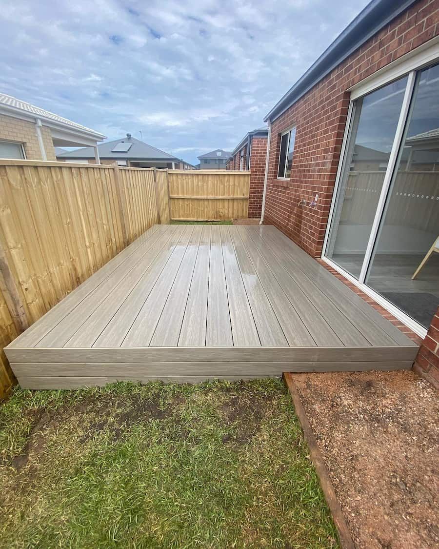 Wooden Deck in The Backyard of A House with A Wooden Fence — Flintoff Constructions in Charlemont, VIC