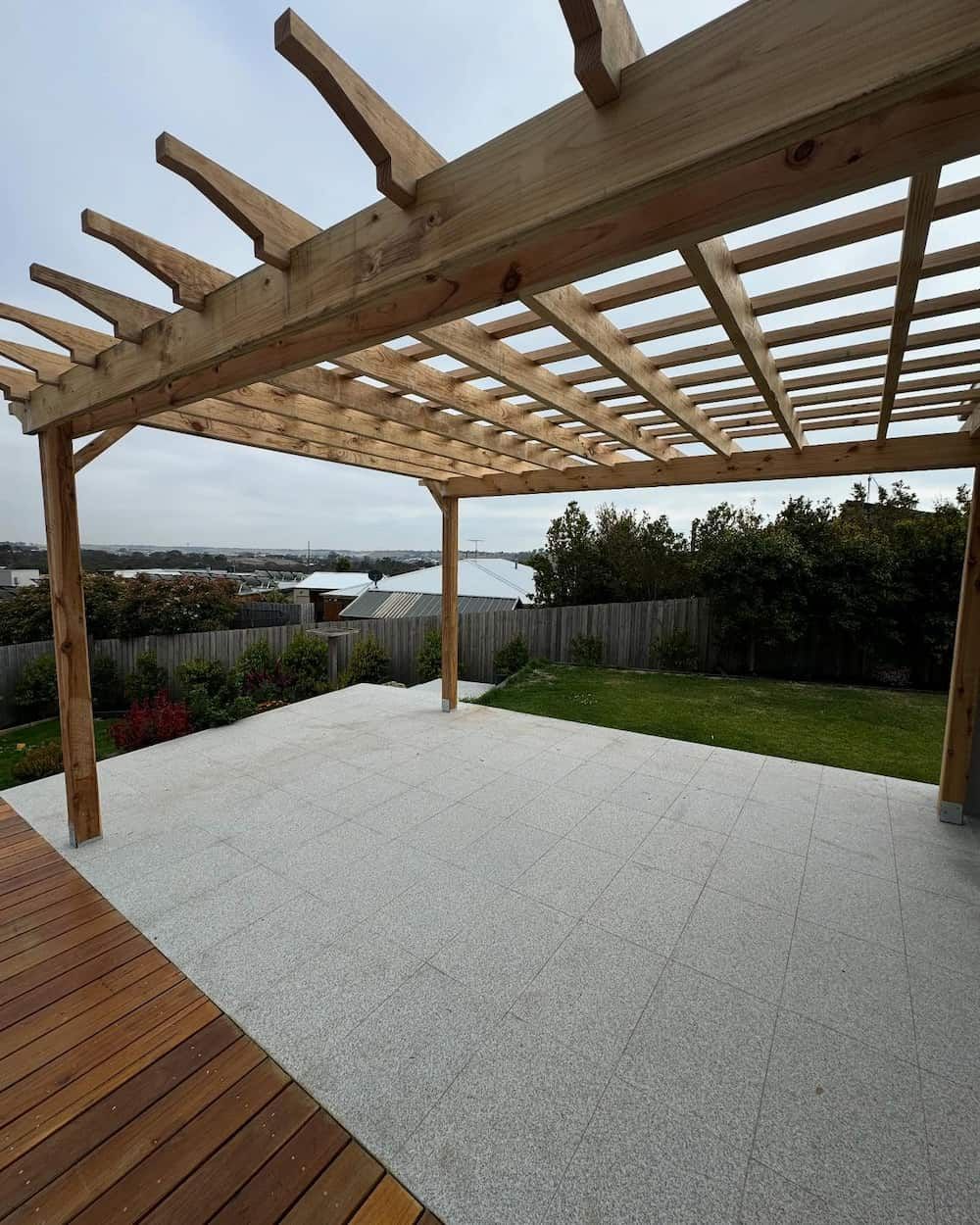 Wooden Pergola Is Sitting on Top of A Wooden Deck — Flintoff Constructions in Charlemont, VIC