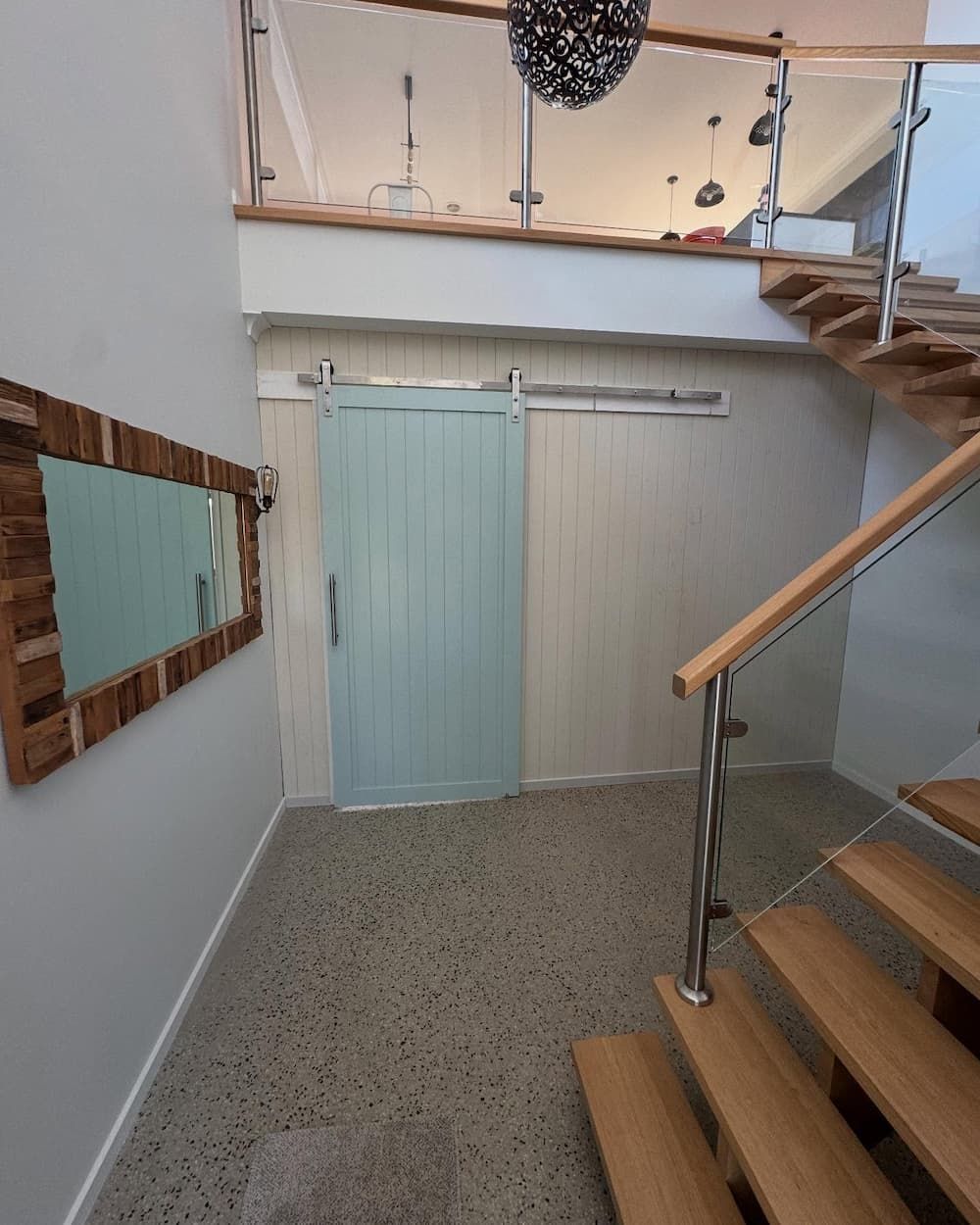 A White wall with a white door and wooden floor — Flintoff Constructions in Charlemont, VIC