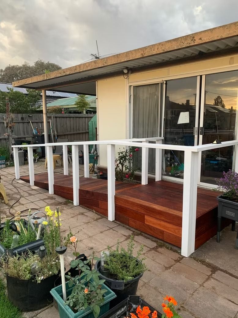 A House with a deck and a white railing down a path — Flintoff Constructions in Charlemont, VIC