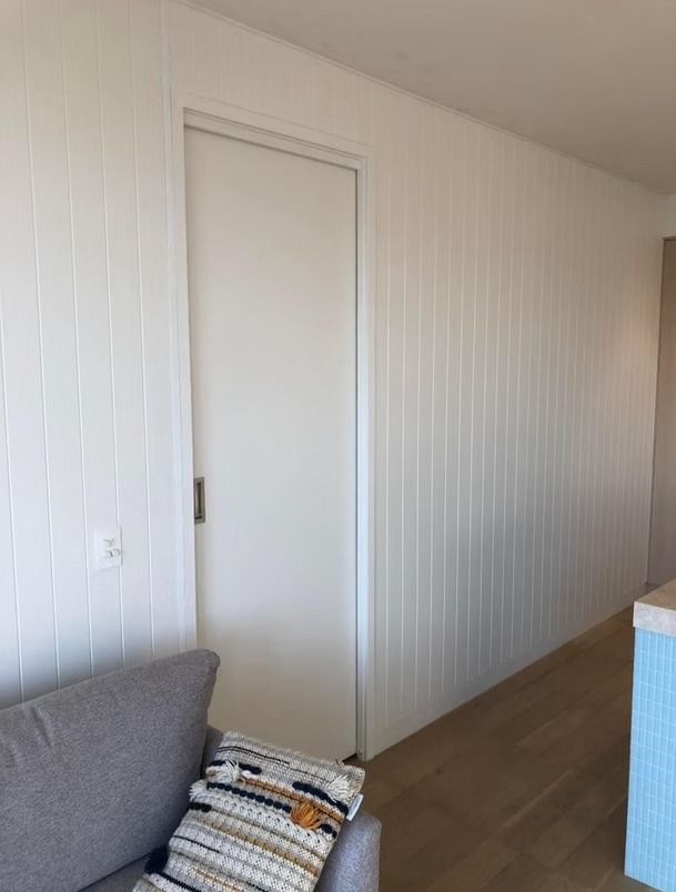 A Hallway with Stairs and A Mirror on The Wall — Flintoff Constructions in Charlemont, VIC