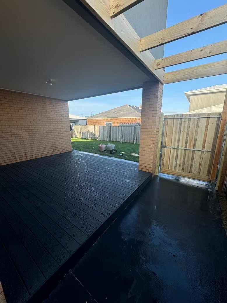 Wooden Deck with A Clear Roof in A Backyard — Flintoff Constructions in Charlemont, VIC