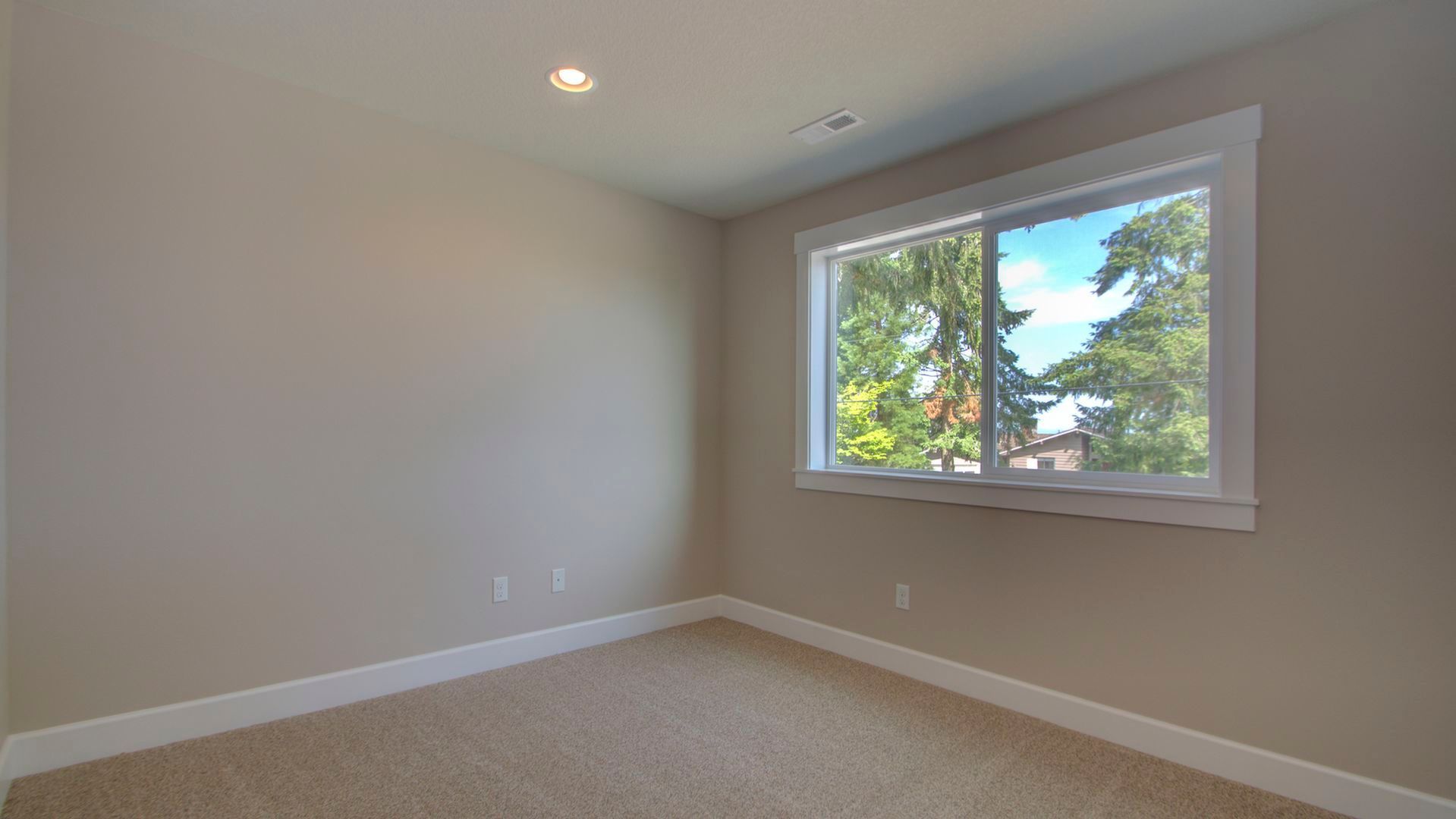There is a large window in the middle of the room.