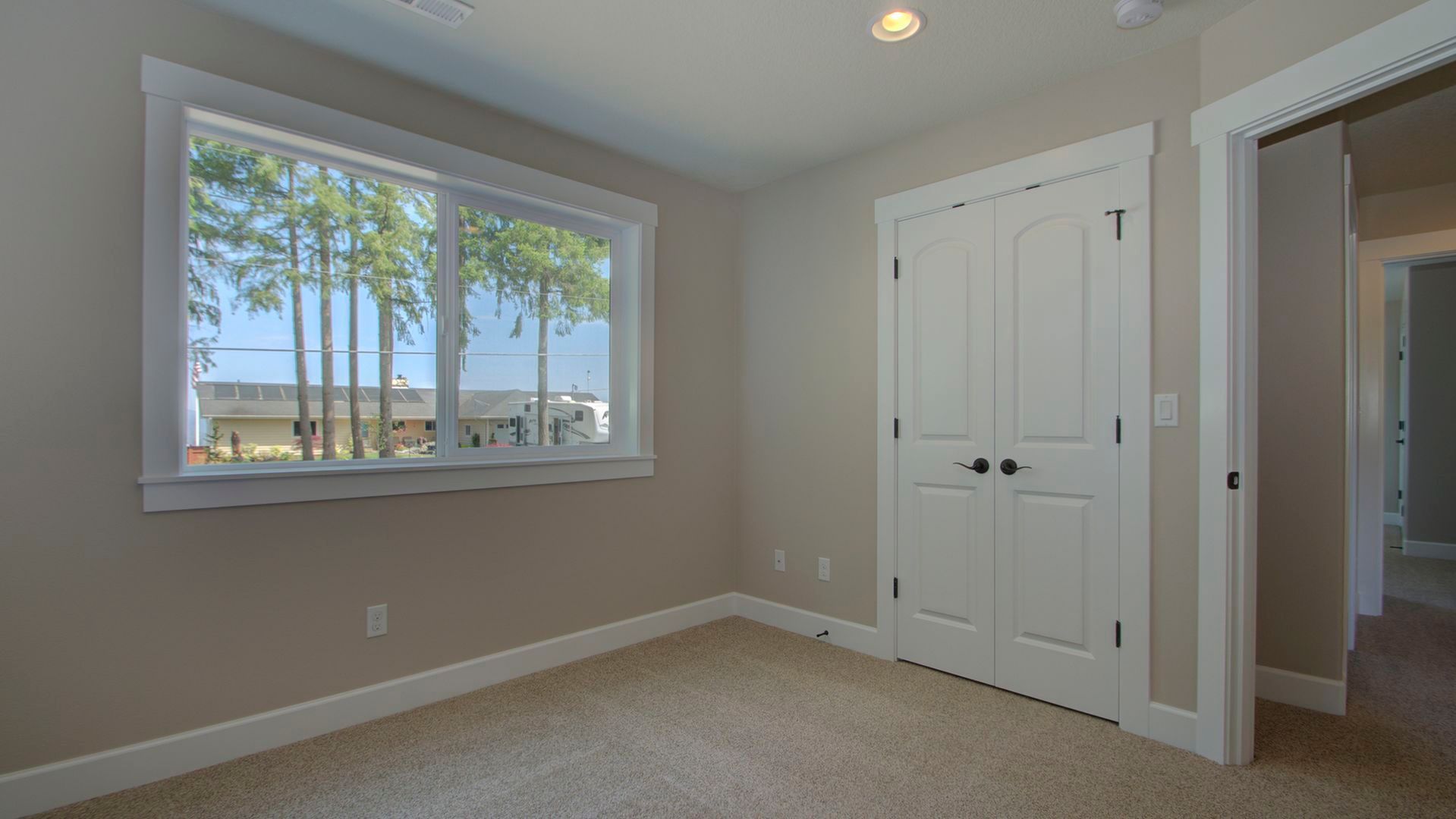 There is a large window in the middle of the room.