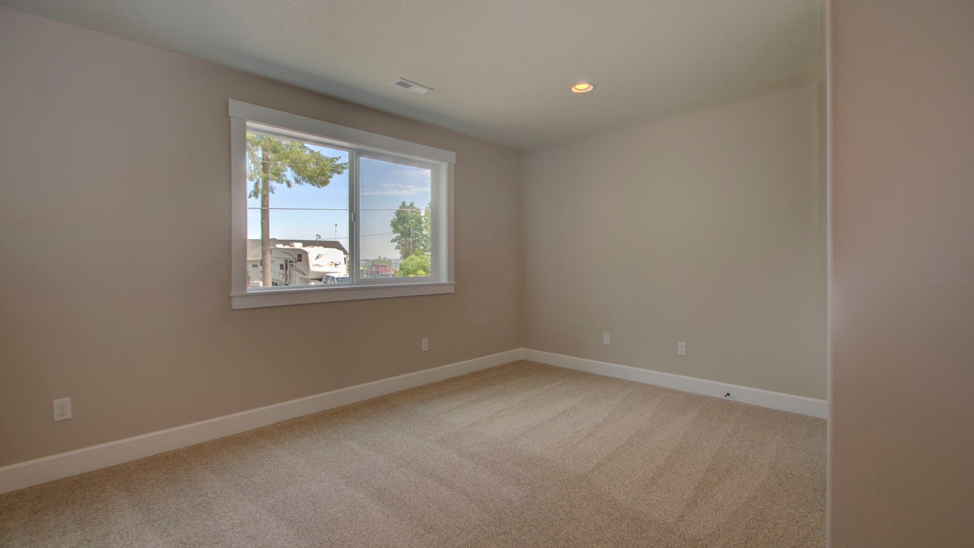 There is a large window in the middle of the room.