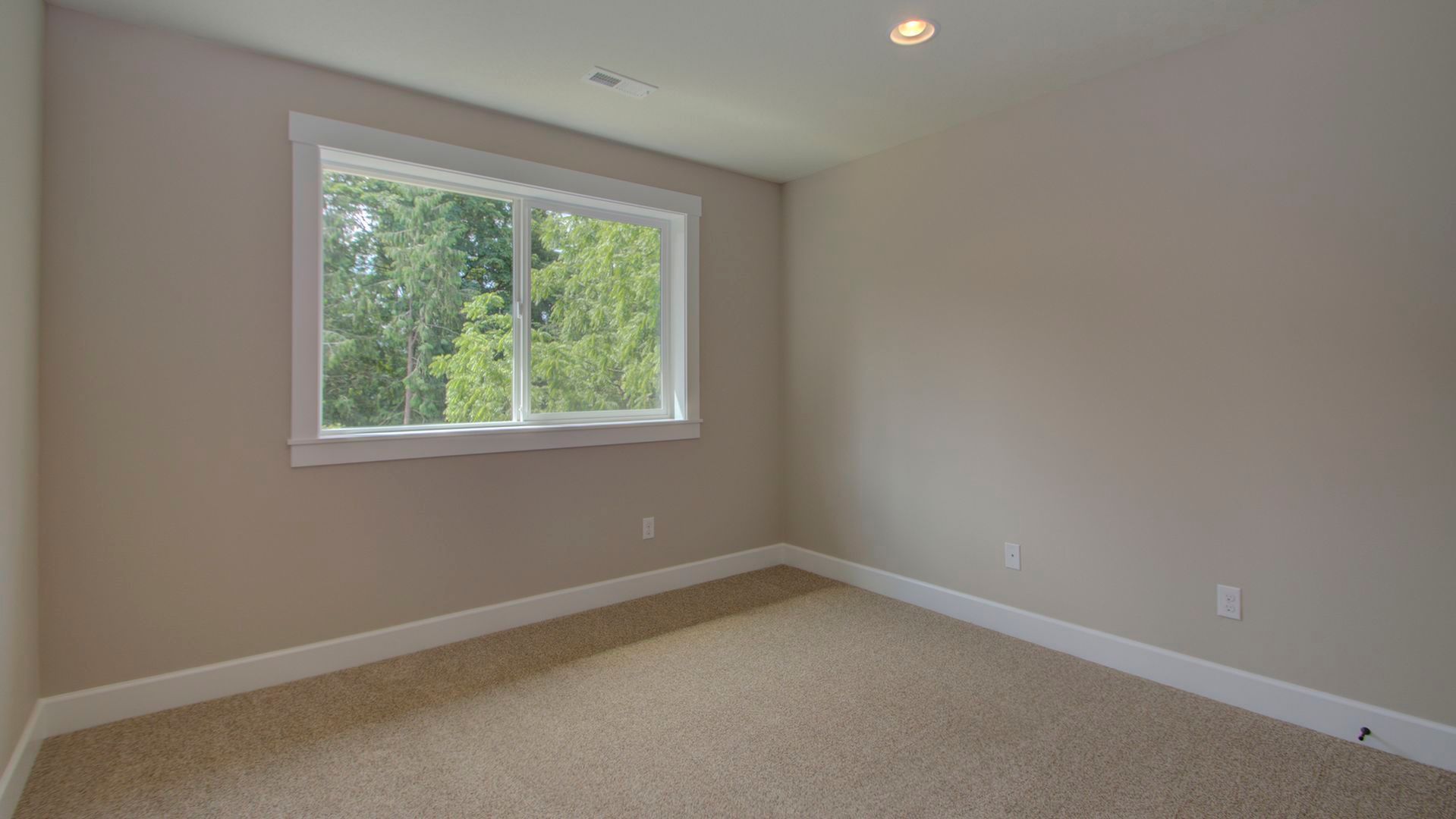 There is a large window in the middle of the room.