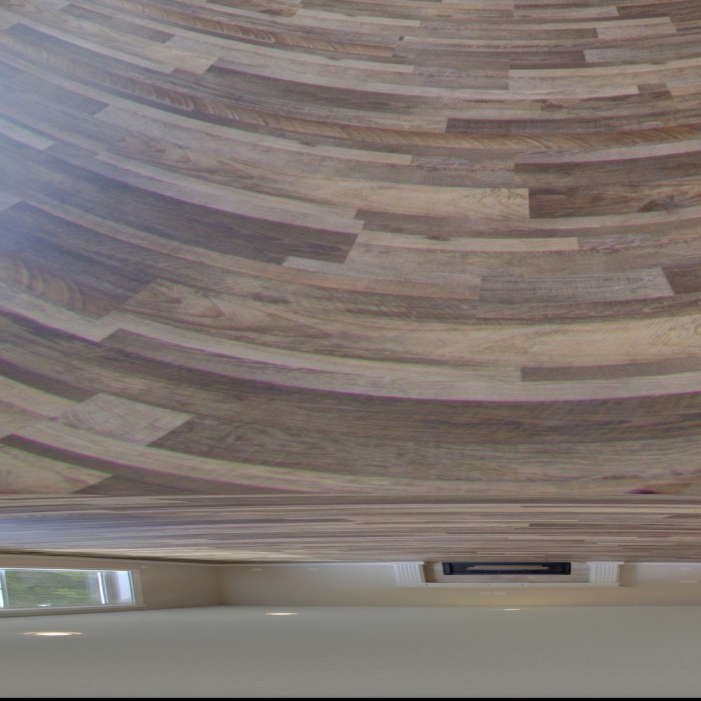 A close up of a wooden floor in a room.
