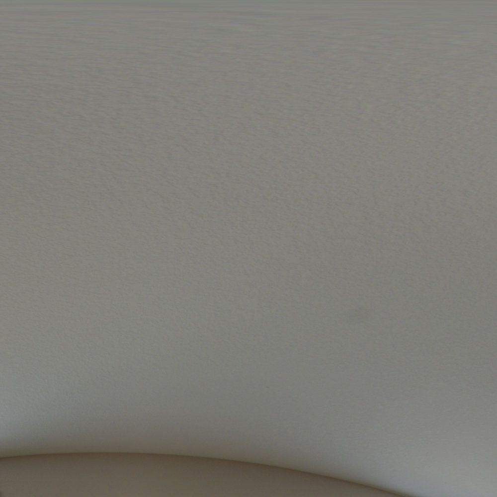 A close up of a white wall with a curve in it.