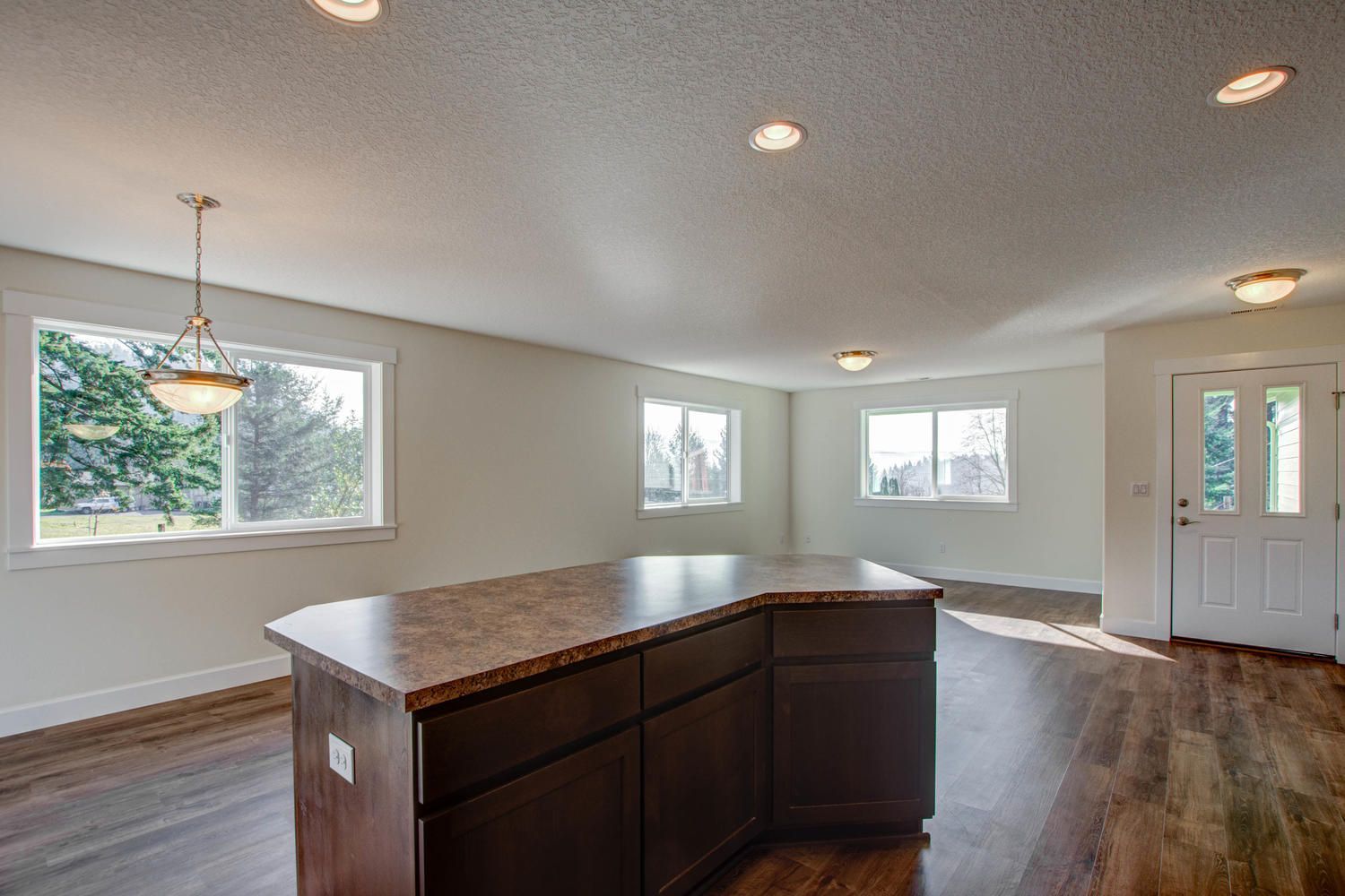 There is a large island in the middle of the room.