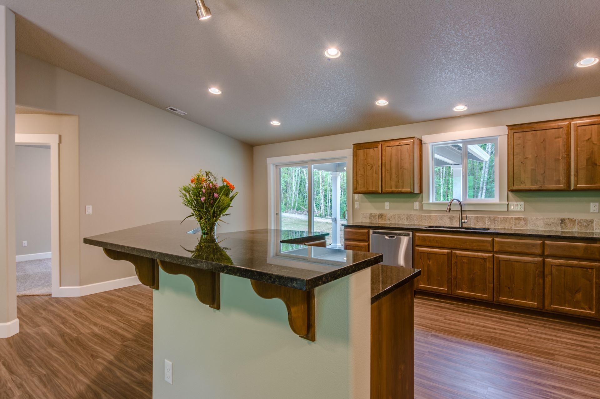 There is a large island in the middle of the kitchen.
