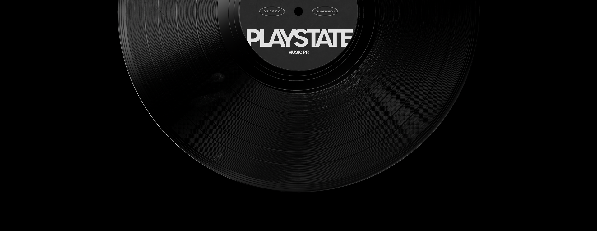 A black and white photo of a record label that says playstate on it.