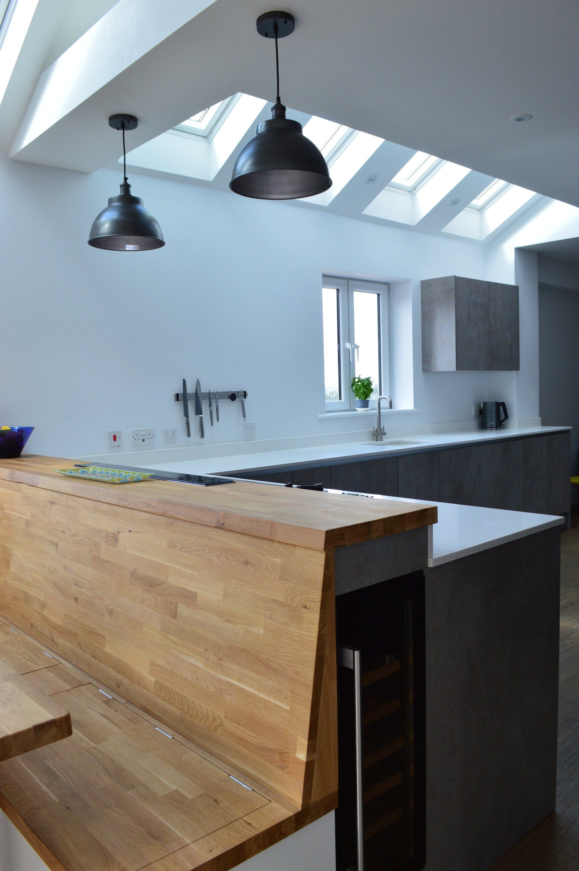 Modern concrete kitchen and dining room completed in 2017