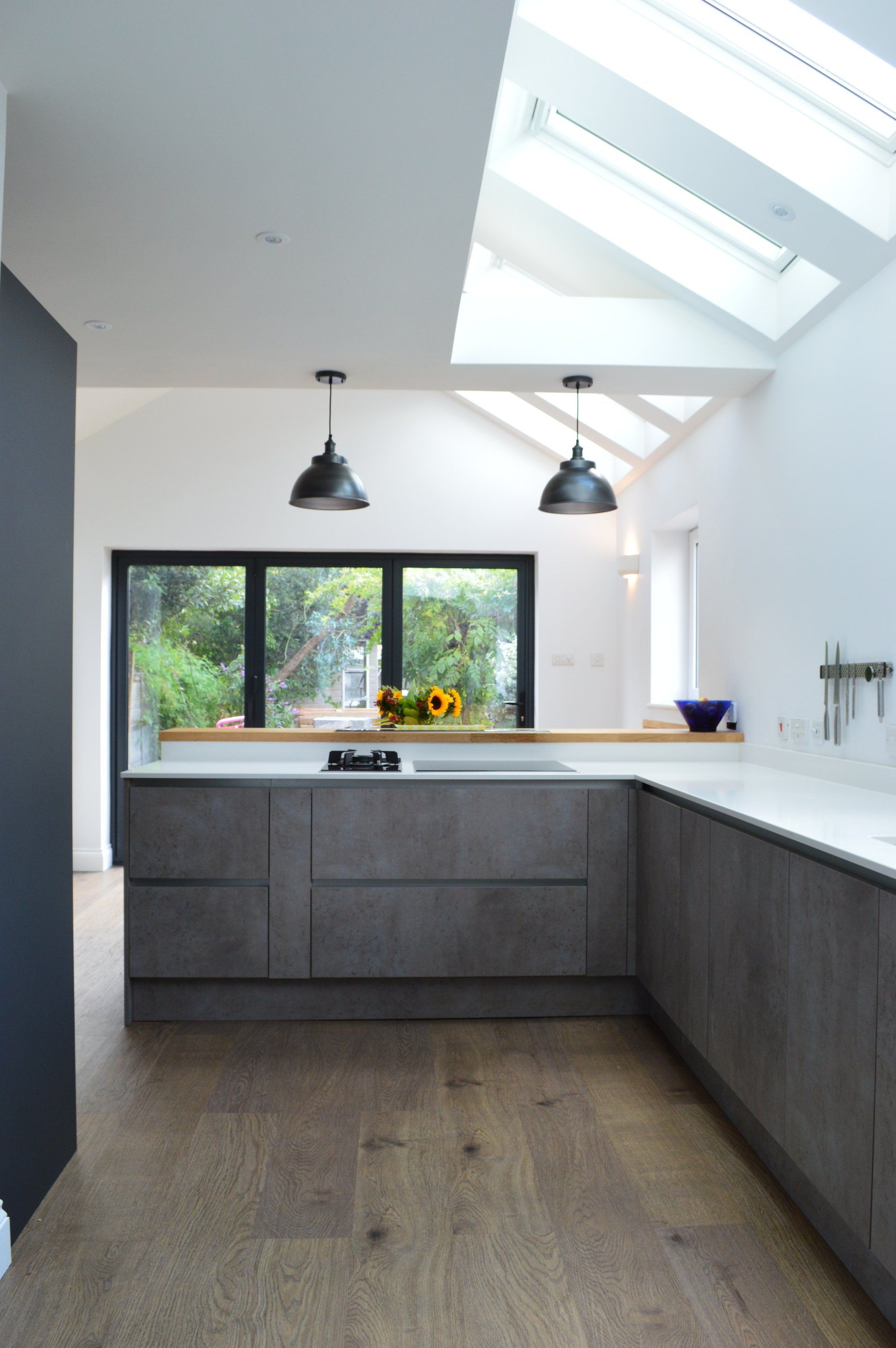 Modern concrete kitchen and dining room completed in 2017