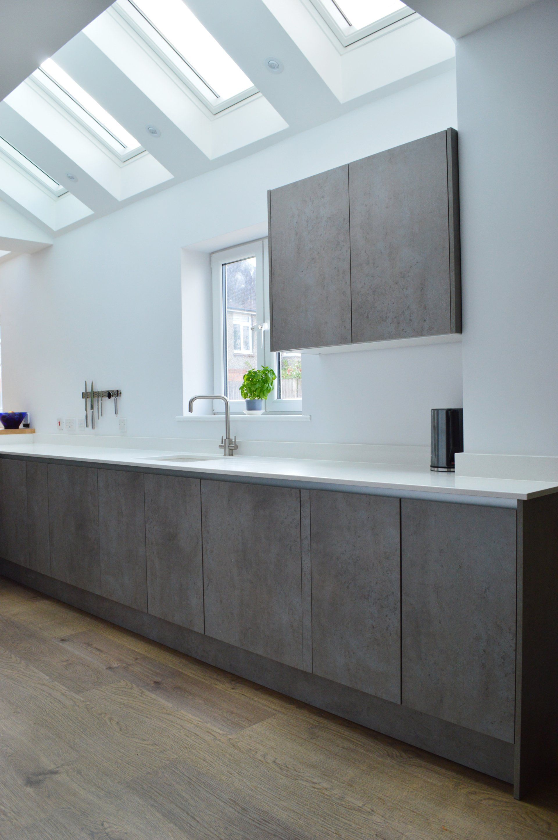 Modern concrete kitchen and dining room completed in 2017