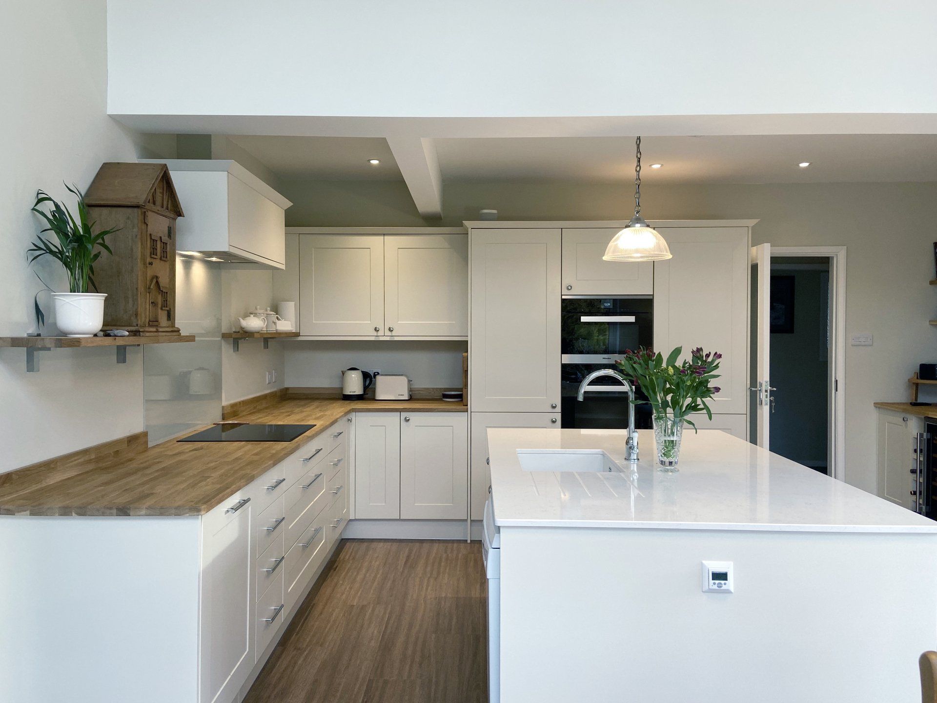 Contemporary, light, cream shaker kitchen for Scarlett Baker in Leamington Spa, 2019