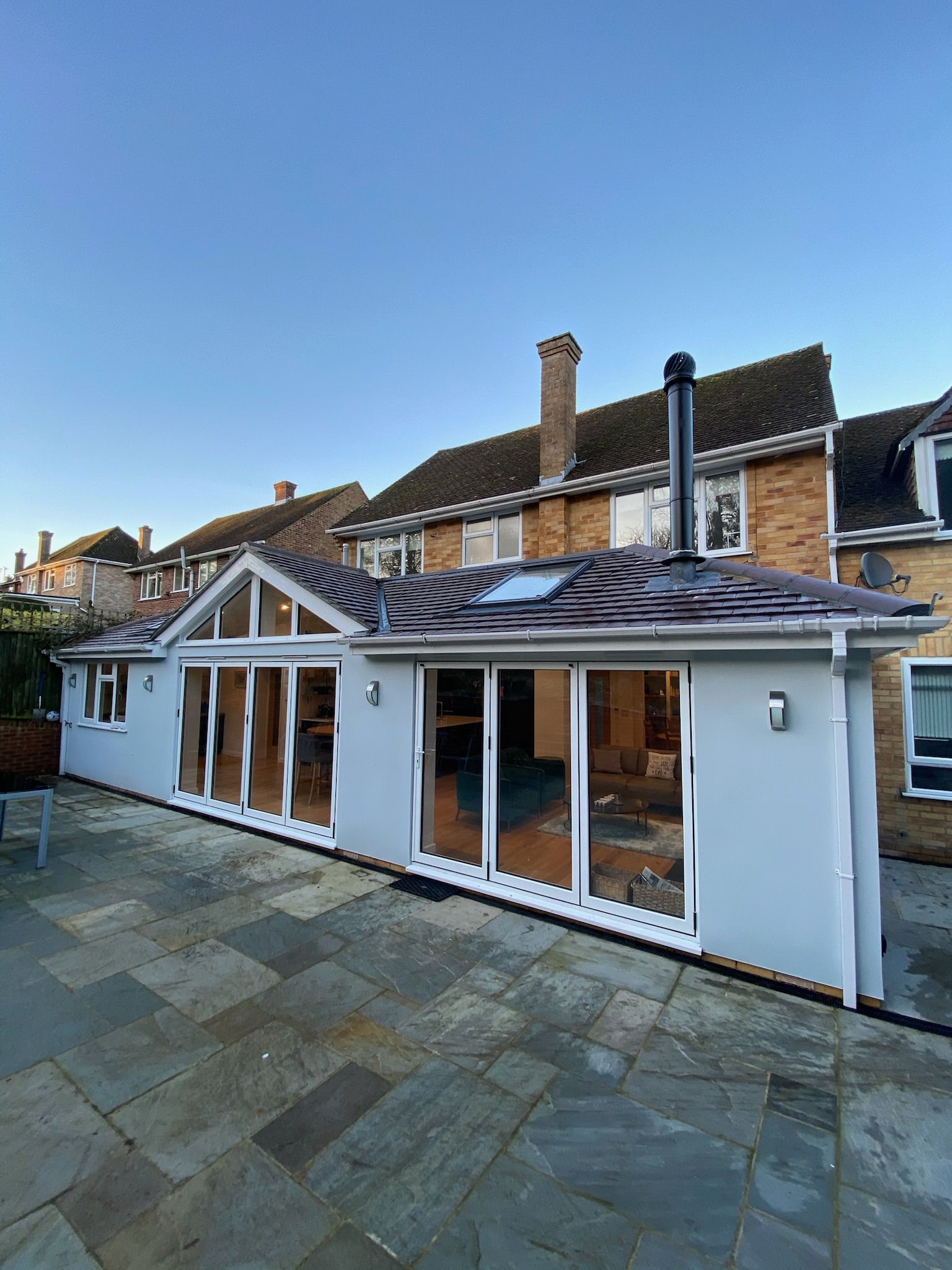 House with modern extension including bifold doors and lots of glazing