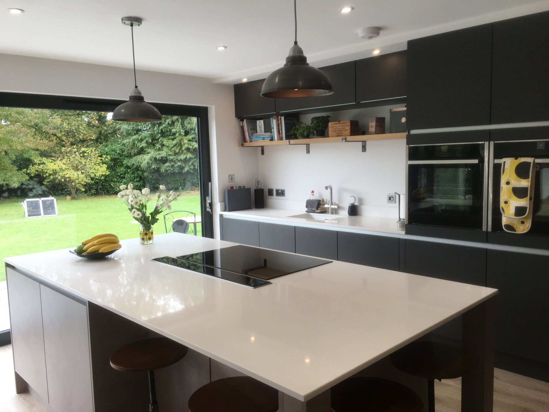 Modern concrete & charcoal family kitchen for Nicki Bennet, Newbury, in 2017